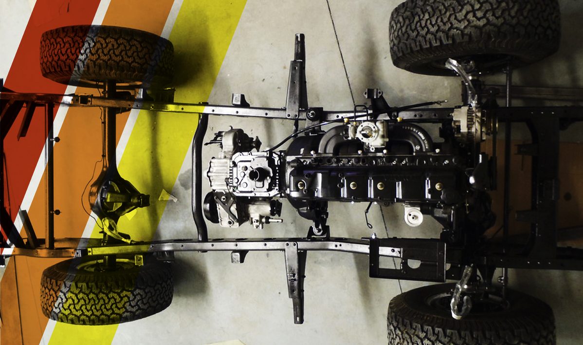 BJ40 bare chassis — overhead frame-off view, Yota Universe workshop